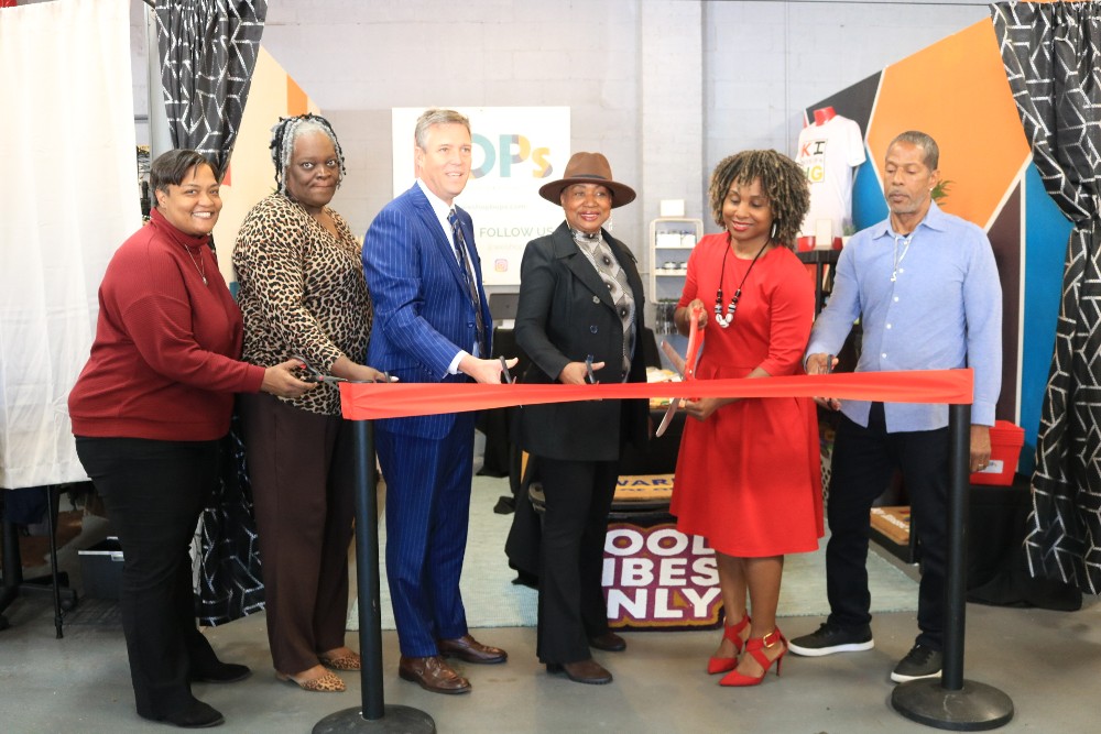 Layla Sewell (second from right) joins Columbia Mayor Daniel Rickenmann and other officials at the grand opening of her shop, BOPs, located at 2222 Sumter St. (Photo/City of Columbia)