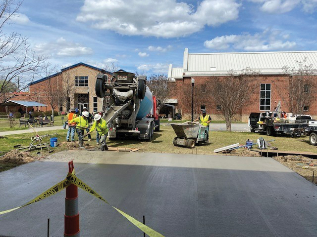 A recently poured concrete pad will serve as a basketball court for clients at Transitions Homeless Center. (Photo/Provided)