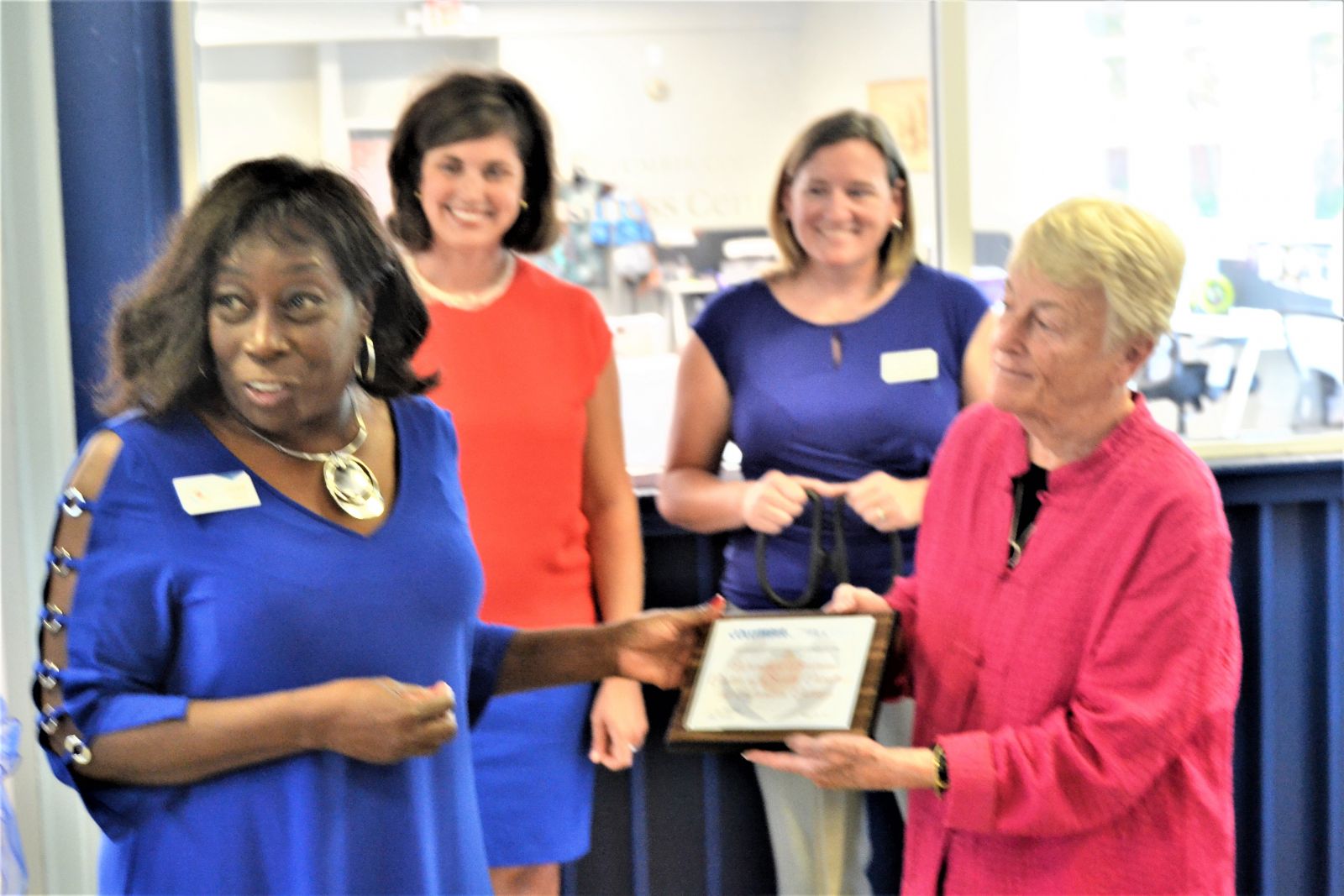 Henri Baskins, executive vice president of the Columbia Chamber of Commerce (from left), Women's Business Center of South Carolina co-founders Katherine Swartz-Hilton and Kasie Whitener, and Columbia College president Carol Moore celebrate Thursday's ribbon cutting. (Photo/Travis Boland)