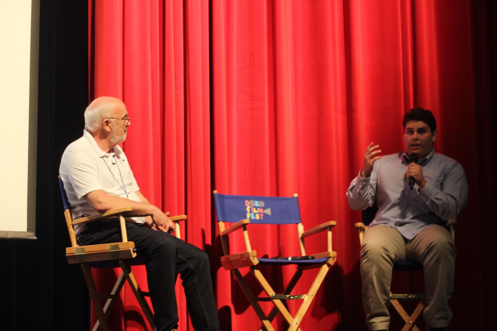 Luke Evans (right), winner of the Best Short Film category, talks with Doko Film Fest founder Ray Smith. (Photo/Christina Lee Knauss)