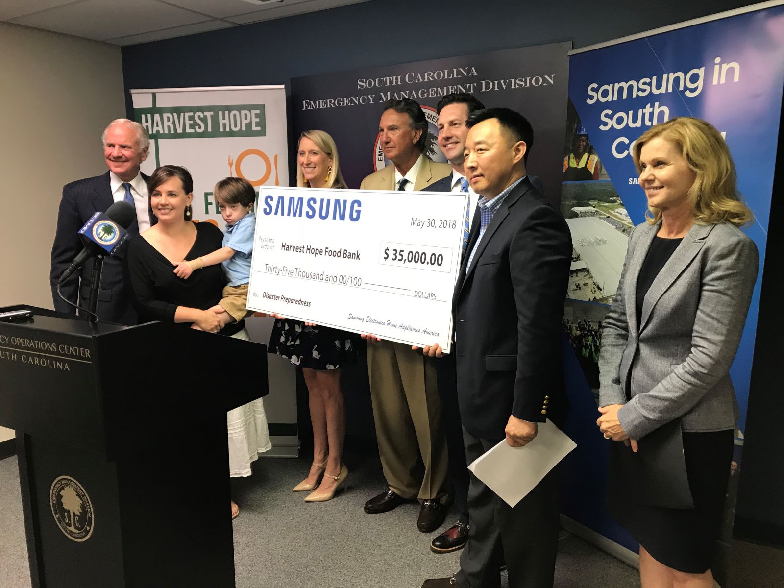 Left to right: Gov. Henry McMaster joins Samsung, Harvest Hope and DHEC officials at the presentation of Samsung's $35,000 donation to Harvest Hope. (Photo/Provided)