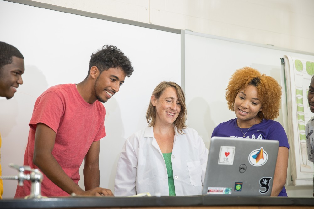 Jessica Furrer (center) head of the Environmental Engineering program at Benedict College, works with students (from left) Isaiah Teasley, Ahmed El-Qaouaq and Ashleigh Reeves. (Photo/Provided)