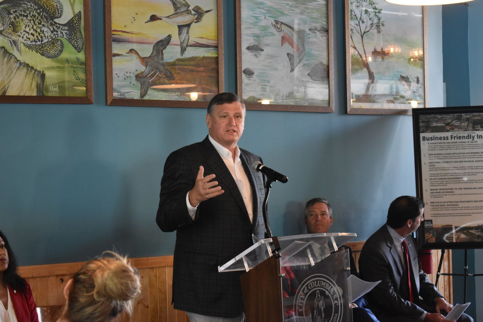 Columbia City Councilman Joe Taylor speaks Monday at a news conference announcing changes to business regulations. Columbia Mayor Daniel Rickenmann looks on. (Photo/Christina Lee Knauss)