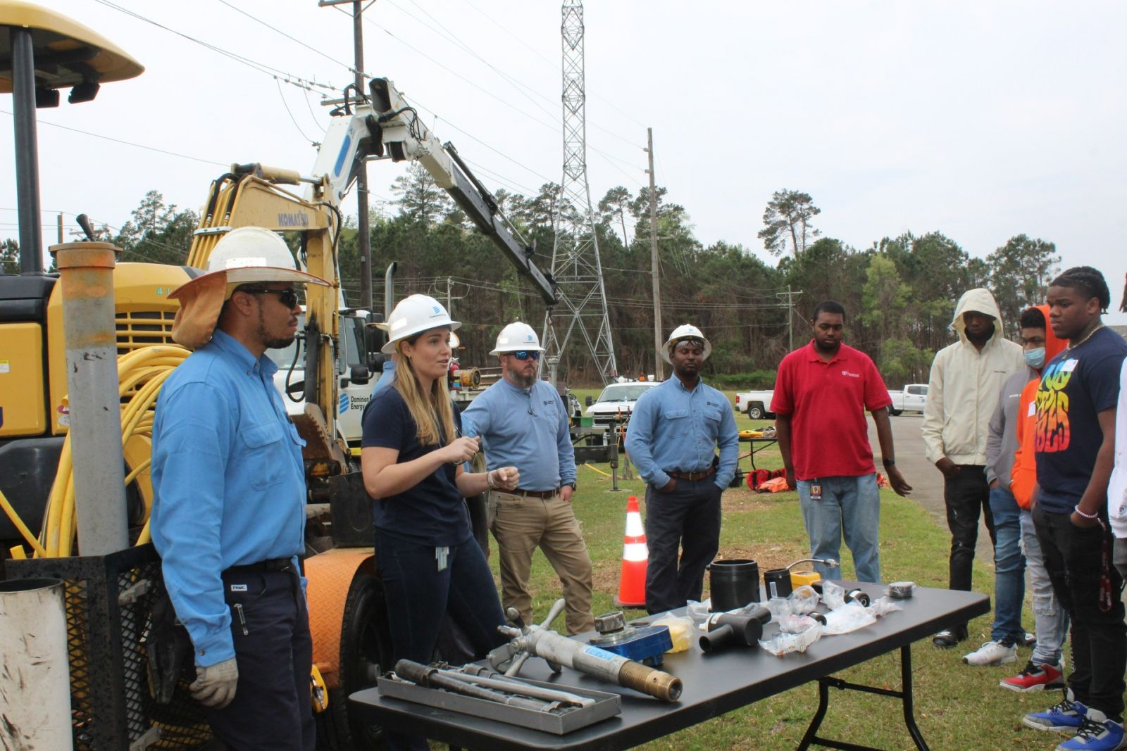 Dominion Energy gas operations employees explain their jobs and the equipment they use to students participating in the company's Skilled Craft Career Day on March 24 at Lake Murray Training Center. The event drew students from Richland, Fairfield and Orangeburg counties, who learned about utility industry careers. (Photo/Christina Lee Knauss)