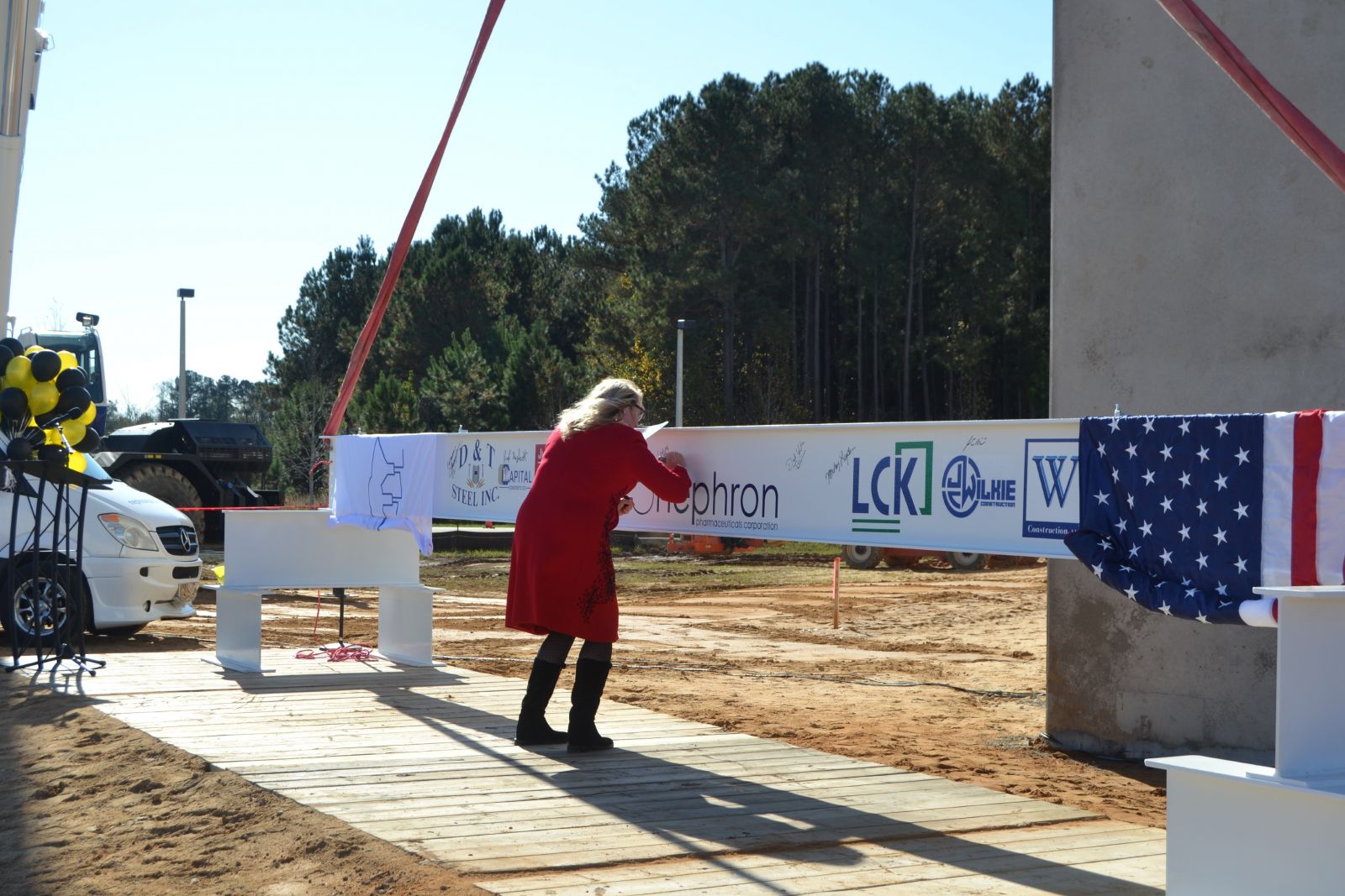 Nephron's $215.8 million expansion is part of $4 billion in capital investment recruited to South Carolina in 2020, according to the S.C. Commerce Department. Nephron CEO Lou Kennedy signs a beam during a milestone construction ceremony last November. (Photo/Melinda Waldrop)